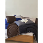 Stripe-pattern bedding set in a modern stripe mix made of breathable percale