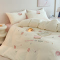 Cotton bedding set with embroidered donut motif and pillowcases Bowlift