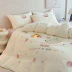 Cotton bedding set with embroidered donut motif and pillowcases Bowlift