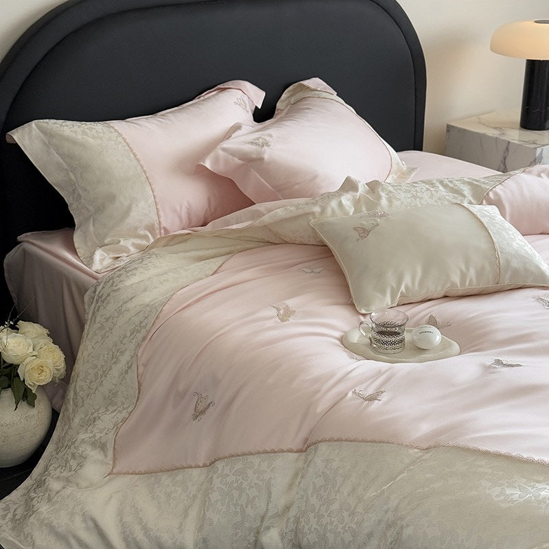 Luxurious cotton satin bedding set with butterfly embroidery and tie band pillow