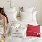 Bedding set with fine embroidery and contrasting piping