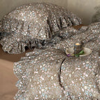 Quilted duvet cover set with ruffle and delicate floral pattern