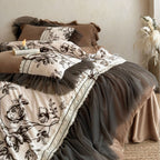 Quilted bedding set with floral pattern, tulle ruffle and decorative frills Bowlift
