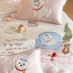 Playful satin bedding set with appliquéd animal motifs and quilted bedspread