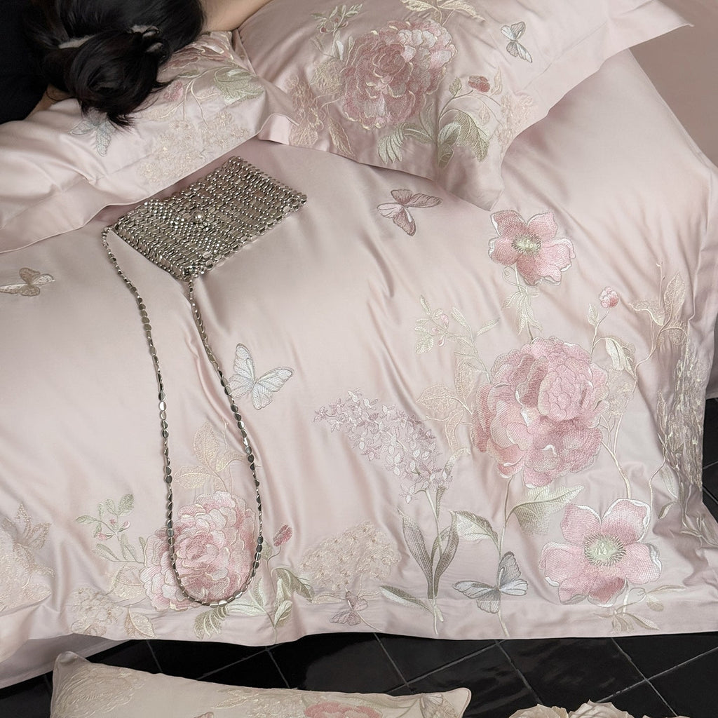 Luxurious satin bedding set with floral embroidery and silk-soft finish Bowlift