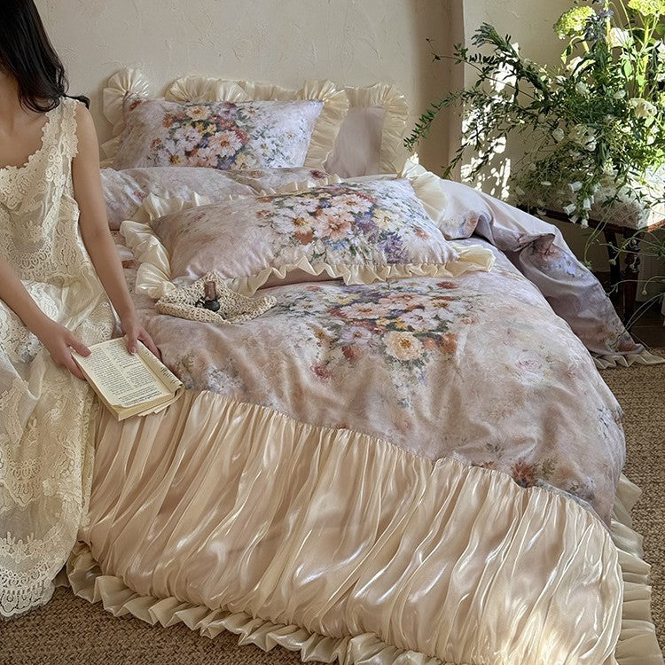 Luxurious bedding set made of cotton satin with floral watercolor print, gathered satin border, and frill pillow