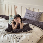 Reversible bedding set made of cotton blend with polka dot pattern and minimalist animal illustration