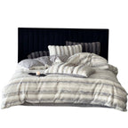 Luxury faux fur throw and cushion set with striped texture