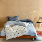 Bedding set made of cotton satin with embroidered horse appliqués and patchwork stripes