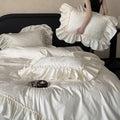 Jacquard-Satin bedding set with ruffled edge and decorative ruffle cushions