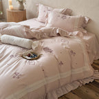 Bedding set with delicate embroidery and ruffled hem
