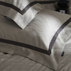 Luxurious satin cotton bedding set with fine piping