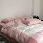 Duvet cover and pillowcase set made of cotton satin with quilted patchwork look and extra soft touch