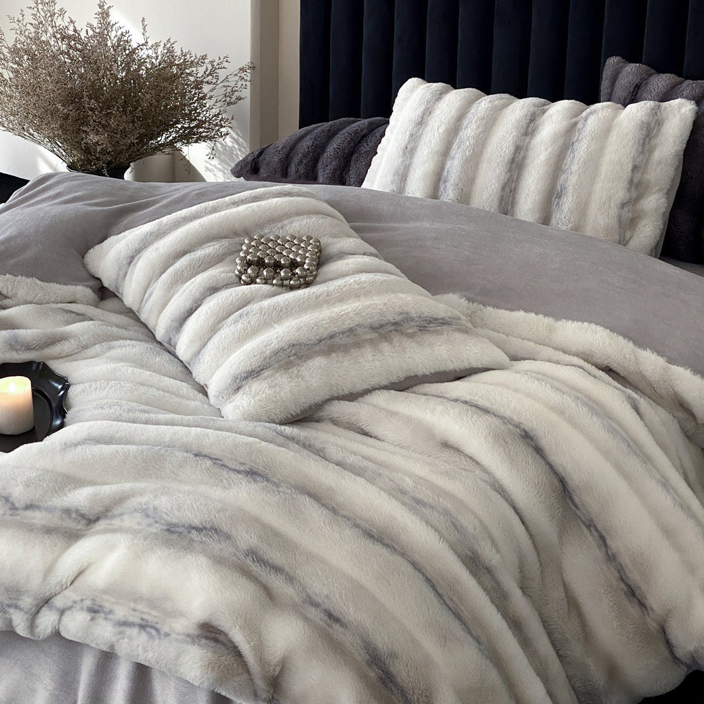 Luxury faux fur throw and cushion set with striped texture