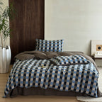 Checked cotton satin bedding set with textured check pattern and quilted bedspread