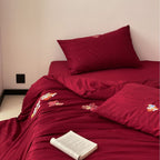 Premium bedding set made of Mako cotton satin with floral jacquard structure and embroidered applications Bowlift