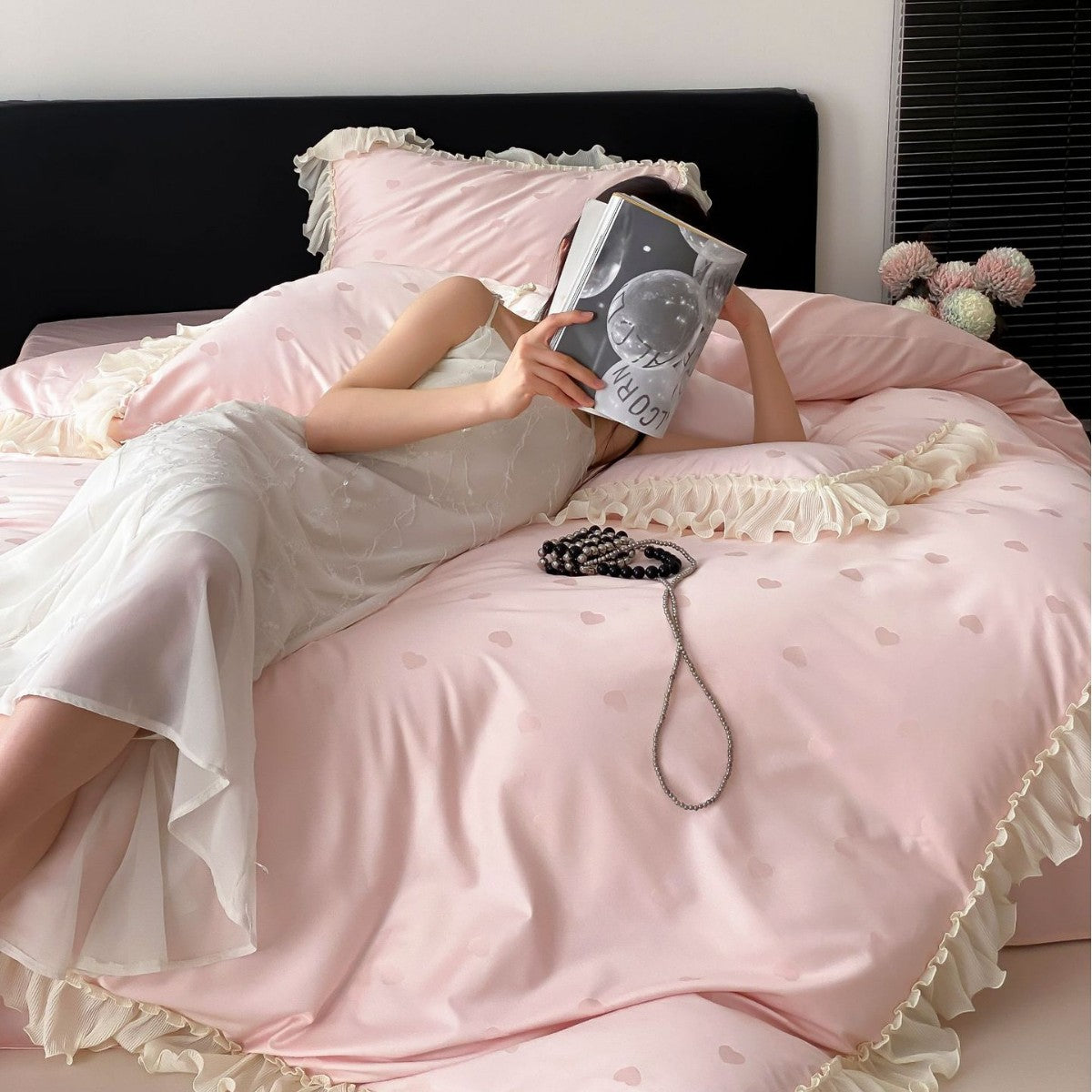 Luxurious satin bedding set with ruffles and subtle heart print Bowlift