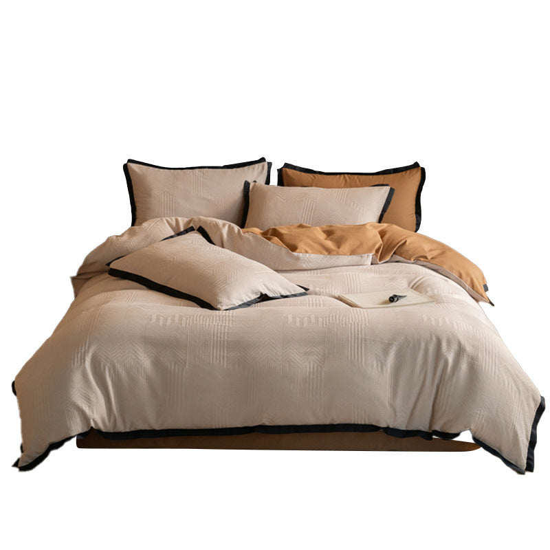 Reversible bedding set with jacquard structure and contrast piping Bowlift