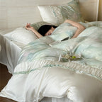Extra soft satin duvet cover set with voluminous ruffle, subtle watercolor leaf print and concealed closure