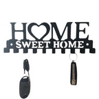 Wall coat rack with heart motif Bowlift