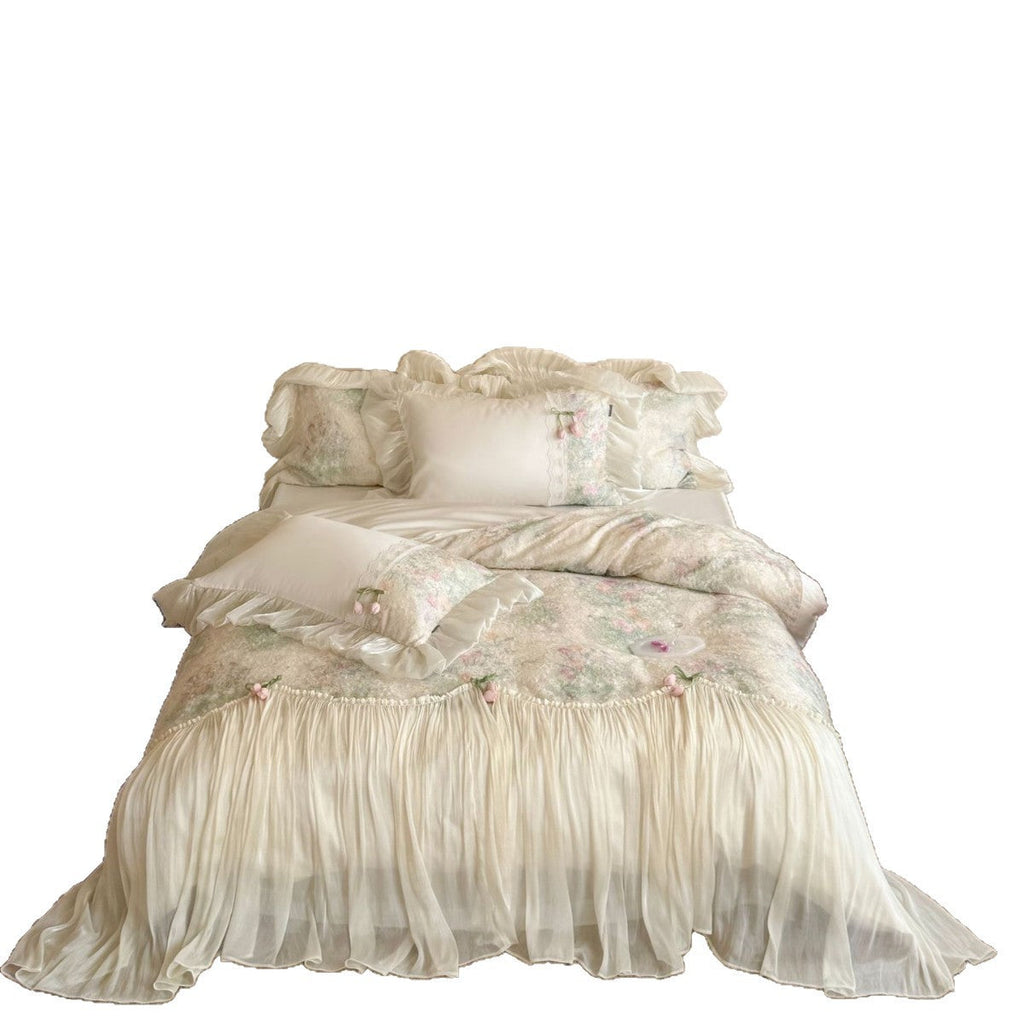 Romantic bedding set with ruffled frill, embroidered decorative pillows, and flowing pleated bedspread Bowlift