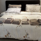 Finely woven cotton bedding set with delicate floral print and decorative ties