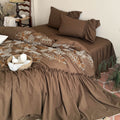 Bedding set with embroidered leaf pattern, ruffled bed skirt and ruffled pillow