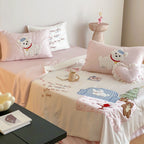 Playful satin bedding set with appliquéd animal motifs and quilted bedspread