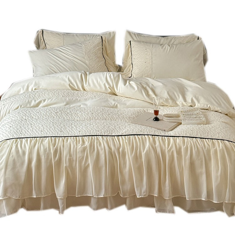 Luxurious bedding set with chiffon ruffles, comforter and contrast piping