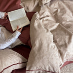 High-quality bedding set made of cotton-lyocell mix with reversible function and fine piping seam