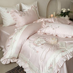 Delicate embroidered cotton satin bedding set with ruffle, satin trim, and rose motif