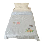 Children's comfort quilt with sweet bunny embroidery and silky satin cover
