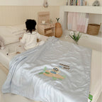 Children's comfort quilt with sweet bunny embroidery and silky satin cover