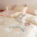 Playful cotton bedding set with appliqués and ruffles
