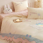 Playful cotton bedding set with appliqués and ruffles