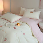 Cotton bedding set with embroidered donut motif and pillowcases Bowlift