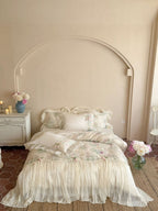 Romantic bedding set with ruffled frill, embroidered decorative pillows, and flowing pleated bedspread Bowlift