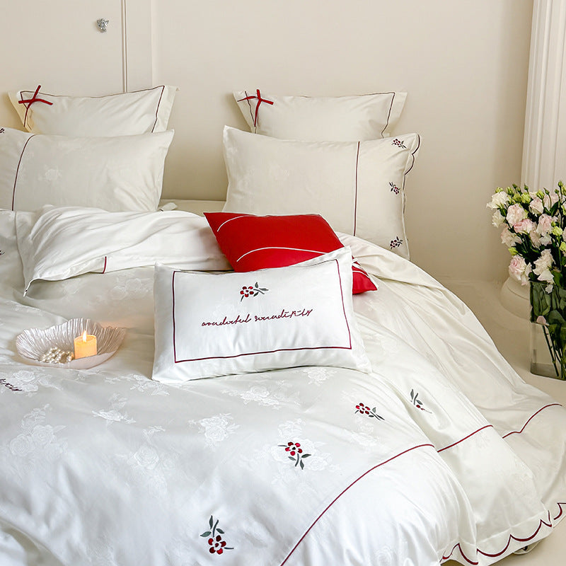 Bedding set with fine embroidery and contrasting piping