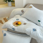 Reversible cotton satin bedding set with fine stripe pattern and cute cat embroidery