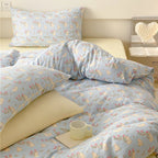 Playful bed linen set made of cotton percale with peach print and reversible function