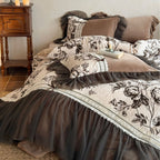 Quilted bedding set with floral pattern, tulle ruffle and decorative frills Bowlift