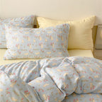 Playful bed linen set made of cotton percale with peach print and reversible function