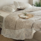 Quilt set in botanical jacquard with embroidered lace ruffle