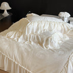 Bedding set in vintage ruffled style made of cotton satin with jacquard medallion and frill