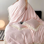Luxurious satin bedding set with ruffles and subtle heart print Bowlift