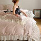 Satin bedding set with ruffled border and fine damask relief