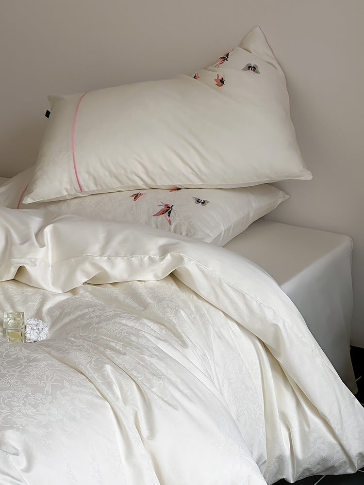 Satin-Jacquard bedding set with embroidered butterfly details