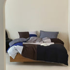 Stripe-pattern bedding set in a modern stripe mix made of breathable percale