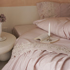 Bedding set with gathered ruffle and fine lace border