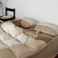 Duvet cover and pillowcase set made of cotton satin with quilted patchwork look and extra soft touch